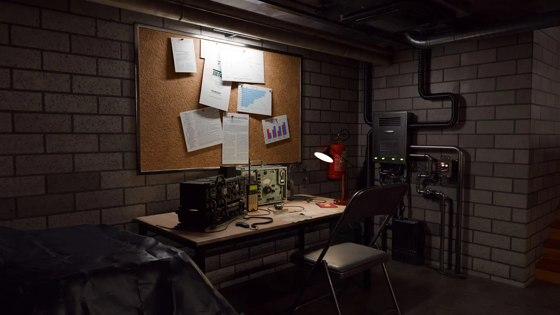 Cork pinboard, radio bench and a single desk lamp.